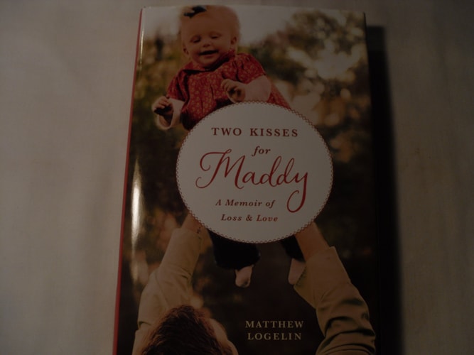 Two Kisses for Maddy: A Memoir of Loss & Love
