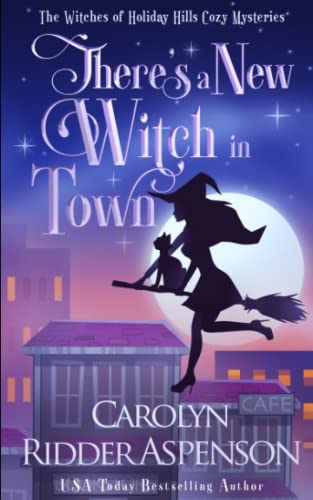 There's a New Witch in Town (The Witches of Holiday Hills Cozy Mystery Series, Band 1)